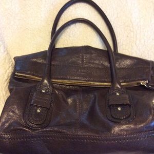 Lauren Ralph Lauren foldover bag.